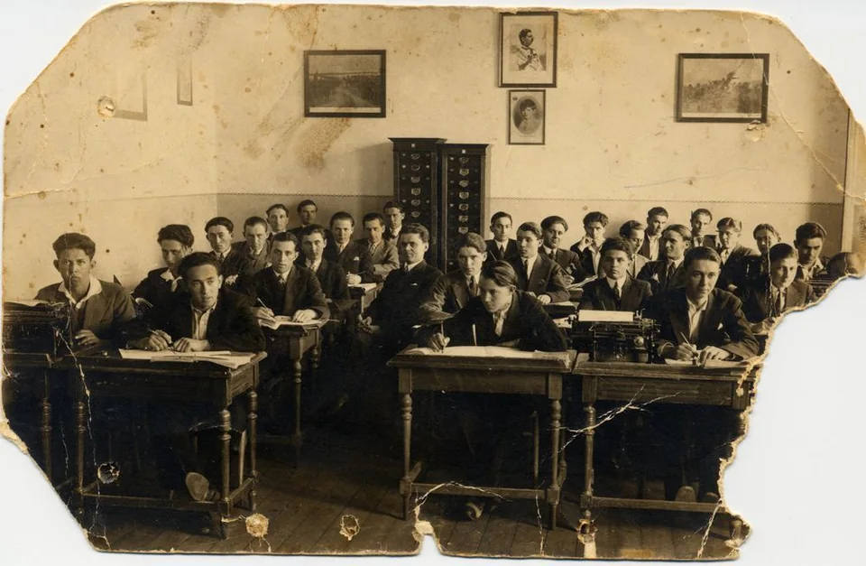 A school group photograph, identified by the family as including Emil in the front row, second from the left.
